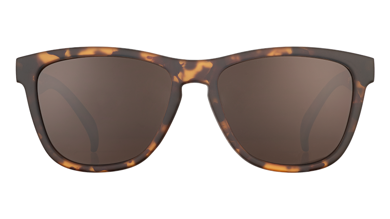Front view of square-framed brown tortoiseshell sunglasses with brown non-reflective lenses on a white background.