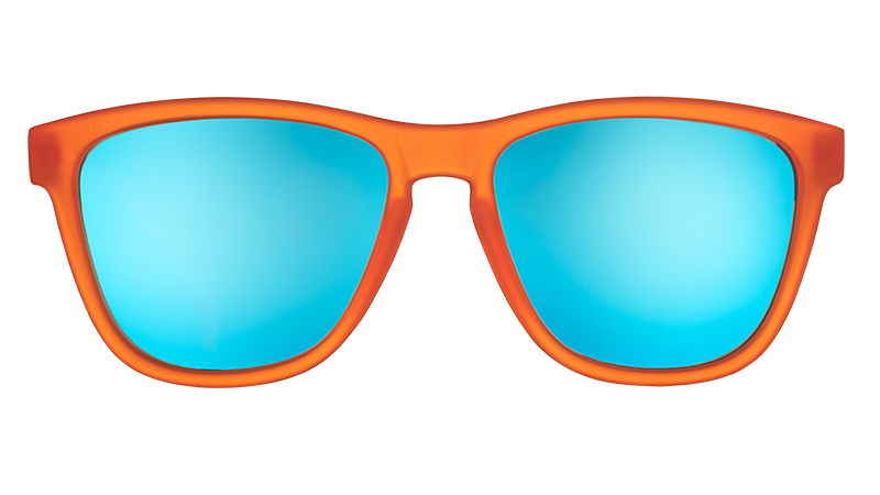 Front view of bright orange sunglasses with blue reflective lenses on a white background.