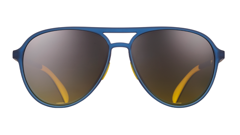 Front view of navy blue aviator sunglasses with dark amber lenses and yellow silicone grip accents inside the frames.