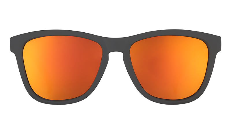 Front view of square-shaped black sunglasses with reflective amber lenses.